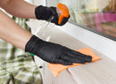 Car valeting in Bodyguards black nitrile gloves with a polishing cloth