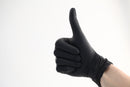 Thumbs up in a Bodyguards GL897 powder-free black nitrile glove